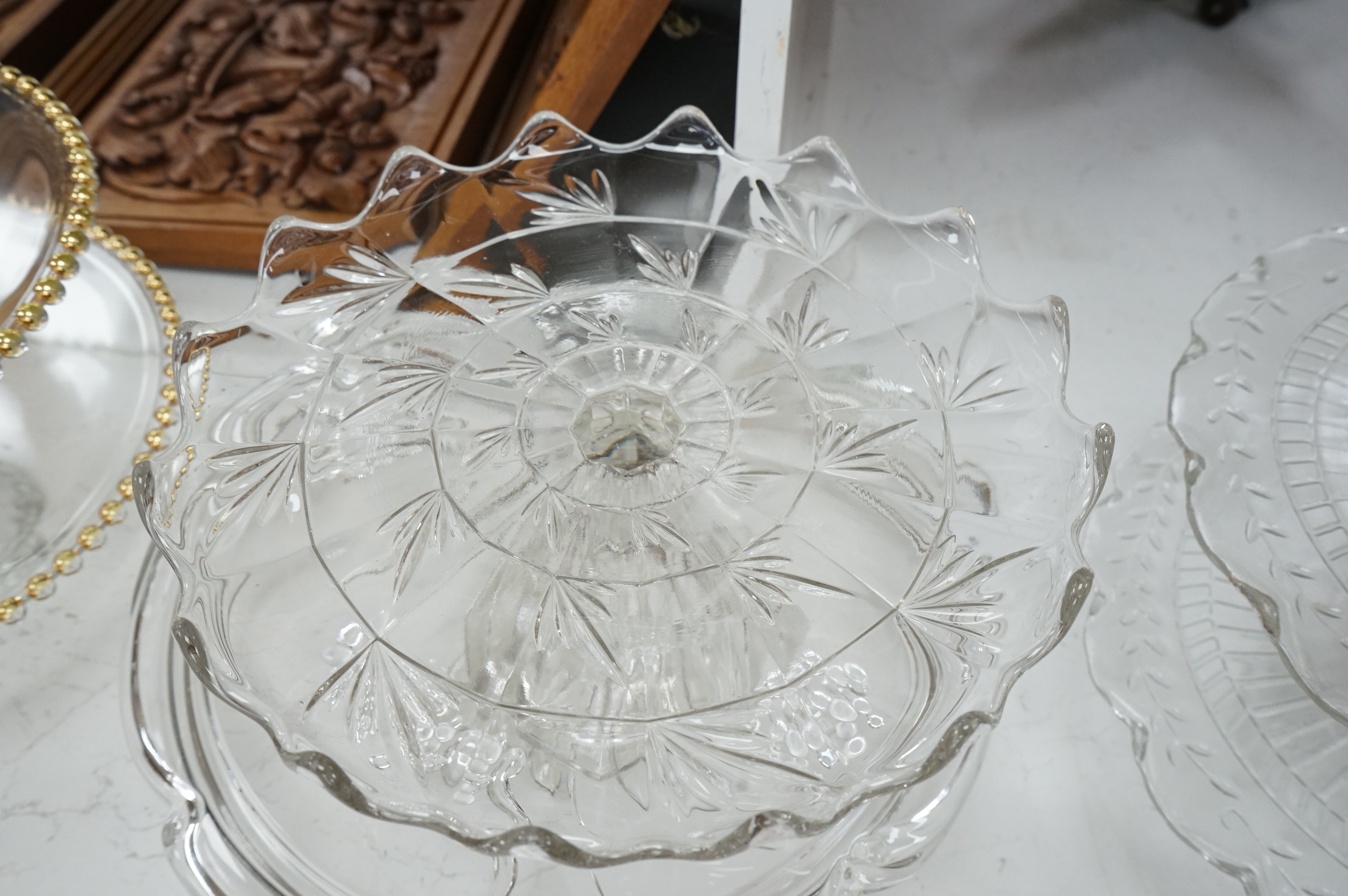 Seven decorative 20th century glass cake tazza, largest 36cm diameter